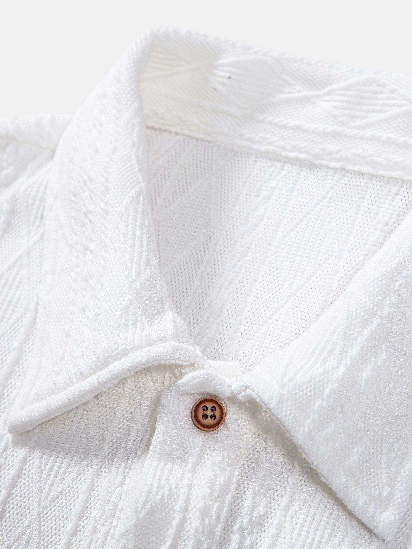 Geometric Jacquard Polo with Knitted Rhombus Design